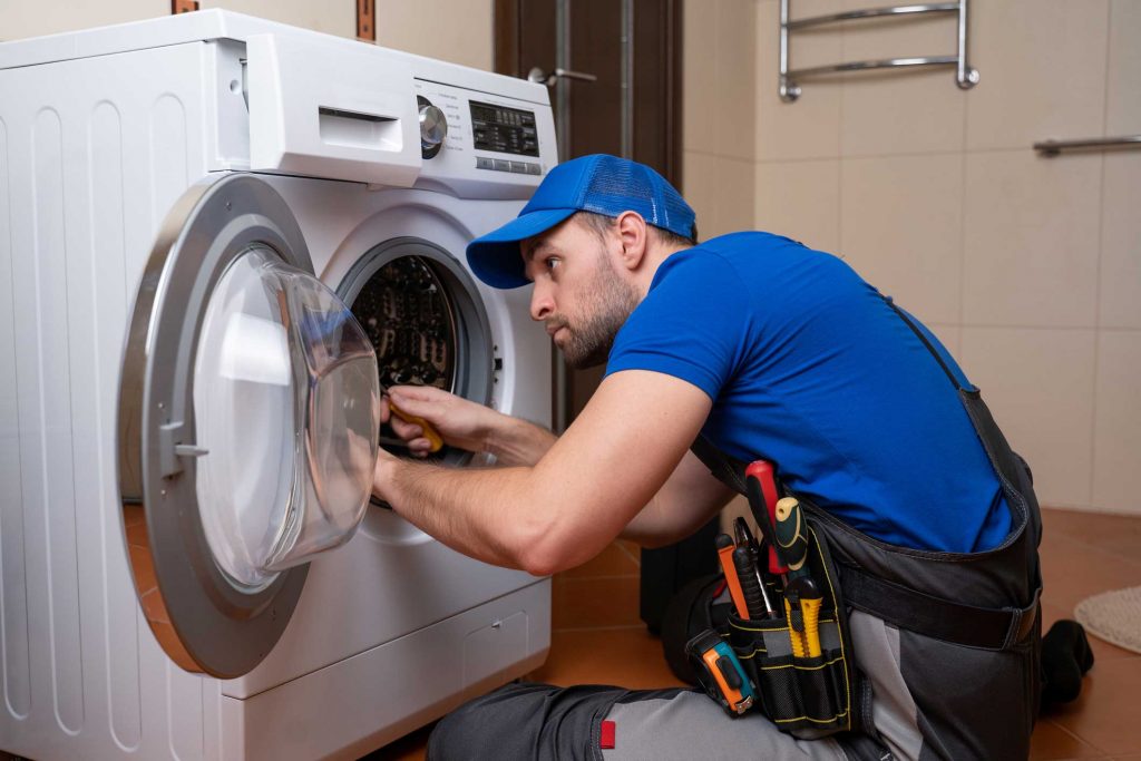 a technician repairing a washer and dryer repair north charleston